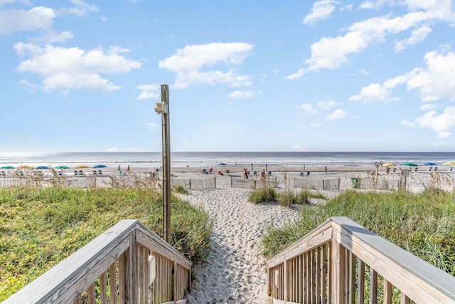 water view featuring a beach view