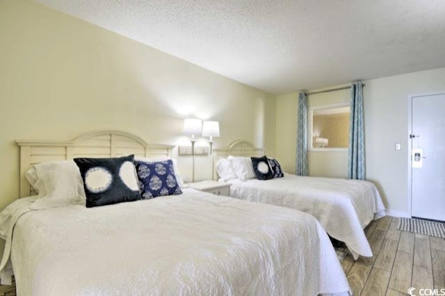 bedroom featuring a textured ceiling