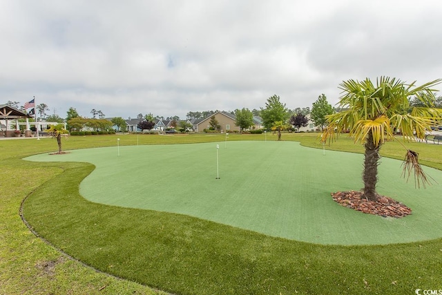 view of community featuring a yard