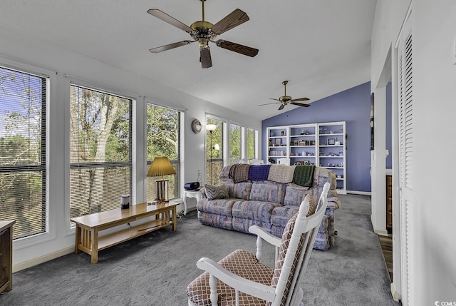 sunroom / solarium featuring ceiling fan and lofted ceiling