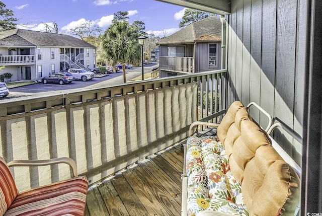 balcony featuring a residential view