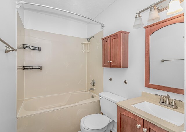 bathroom featuring shower / bath combination, toilet, and vanity