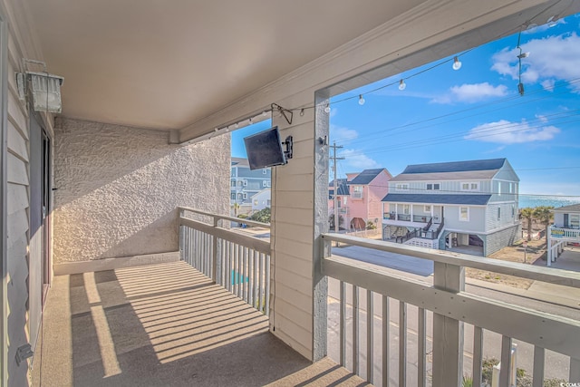 balcony featuring a residential view