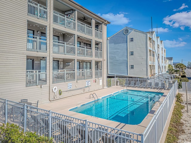 community pool with fence