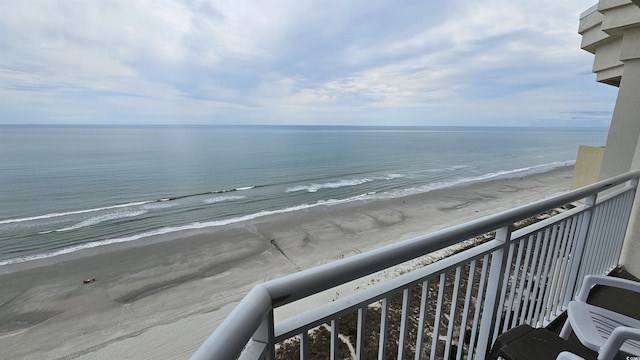 property view of water featuring a beach view