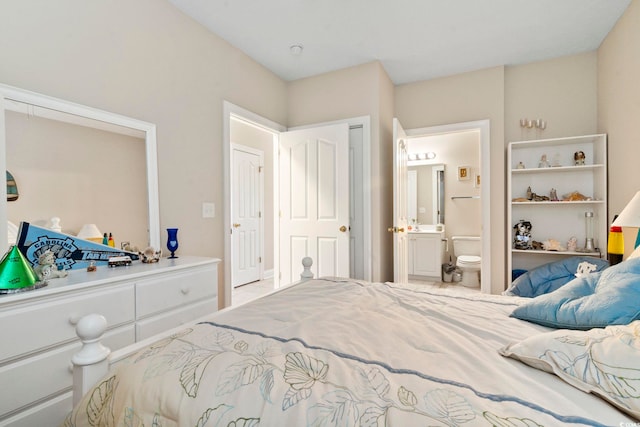 bedroom featuring ensuite bathroom