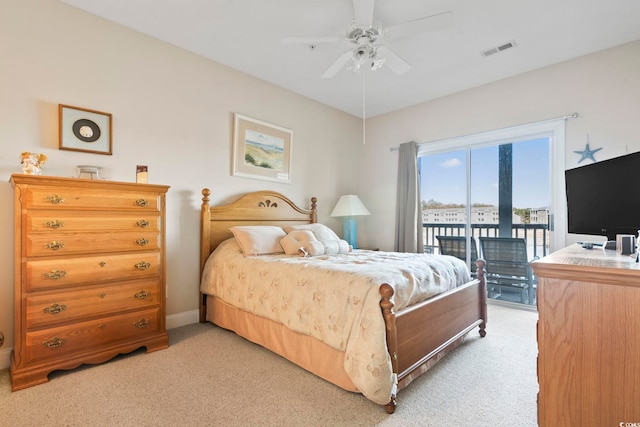 carpeted bedroom with access to outside and ceiling fan