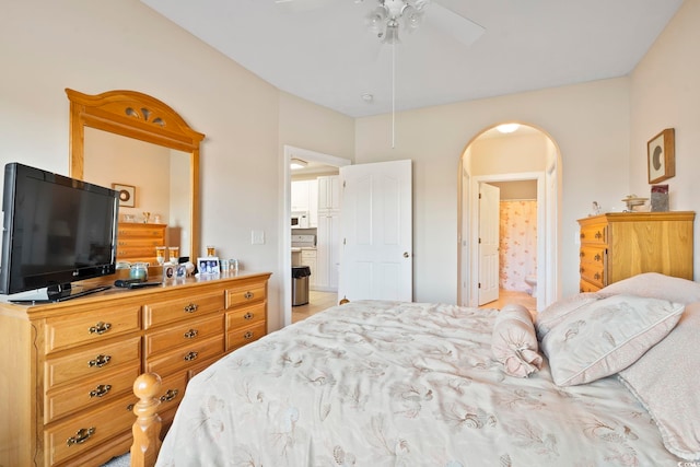 bedroom with ceiling fan and ensuite bathroom