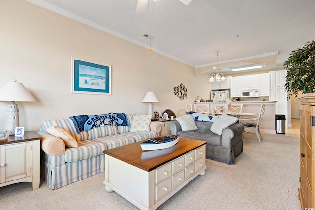 living room featuring light carpet, ceiling fan with notable chandelier, and ornamental molding