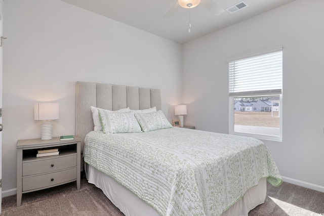 bedroom with ceiling fan, baseboards, visible vents, and carpet floors