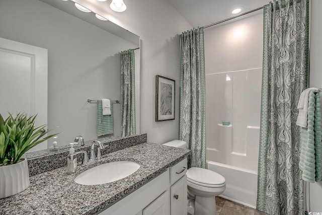 full bathroom featuring vanity, shower / bathtub combination with curtain, tile patterned floors, and toilet