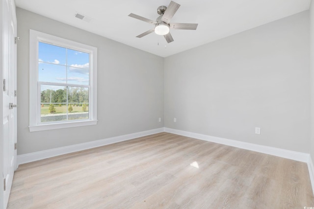 spare room with ceiling fan and light hardwood / wood-style floors