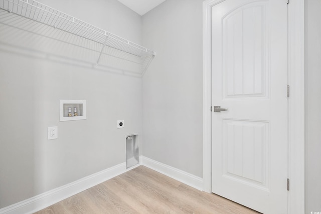 laundry room featuring light hardwood / wood-style floors, hookup for a washing machine, and electric dryer hookup