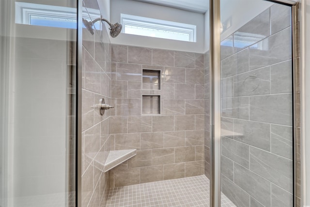 bathroom featuring an enclosed shower