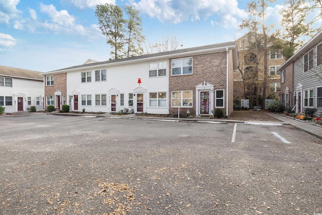 6706 Bryant St Unit B, Myrtle Beach, SC 29572 - view of front of property with uncovered parking and brick siding