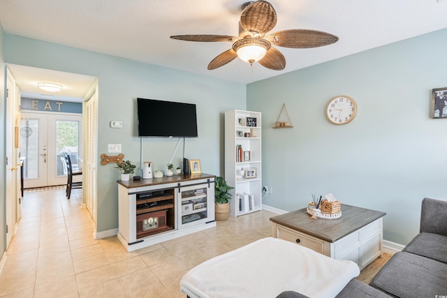 6706 Bryant St Unit B, Myrtle Beach, SC 29572 - living room with a ceiling fan, light tile patterned floors, and baseboards
