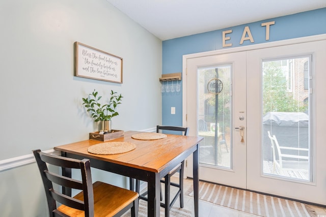 6706 Bryant St Unit B, Myrtle Beach, SC 29572 - dining area featuring french doors and light tile patterned floors