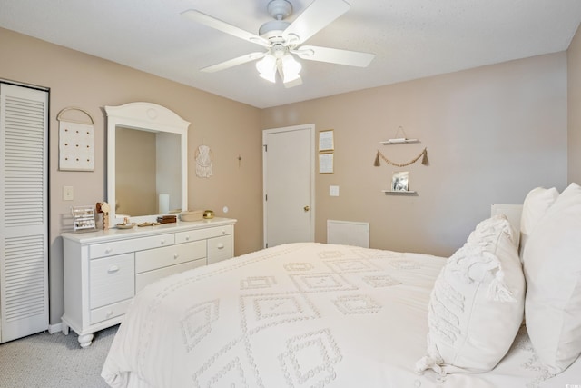 6706 Bryant St Unit B, Myrtle Beach, SC 29572 - bedroom with light carpet, a closet, and ceiling fan