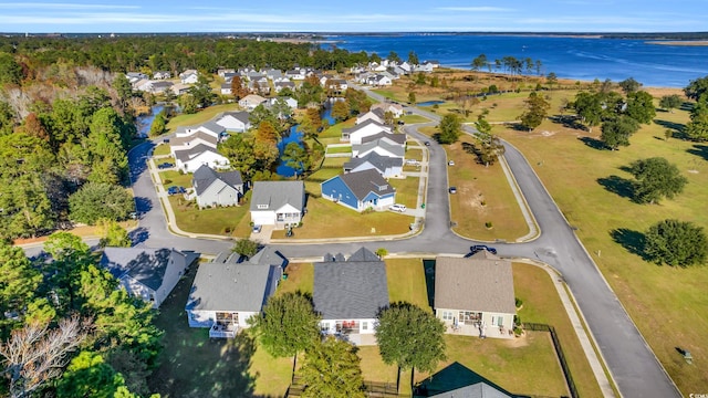 aerial view featuring a water view and a residential view