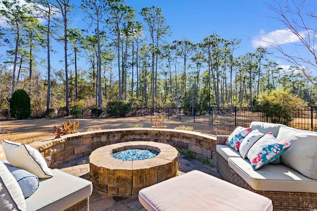 view of patio with a fire pit