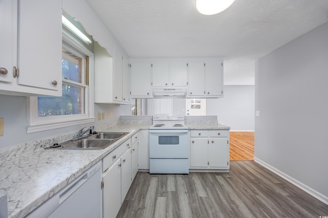 kitchen featuring a textured ceiling, white appliances, sink, light hardwood / wood-style flooring, and white cabinets