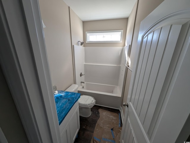 full bathroom featuring shower / tub combination, vanity, and toilet