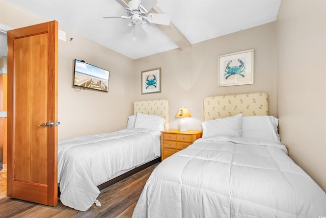 bedroom with beamed ceiling, ceiling fan, and dark hardwood / wood-style floors