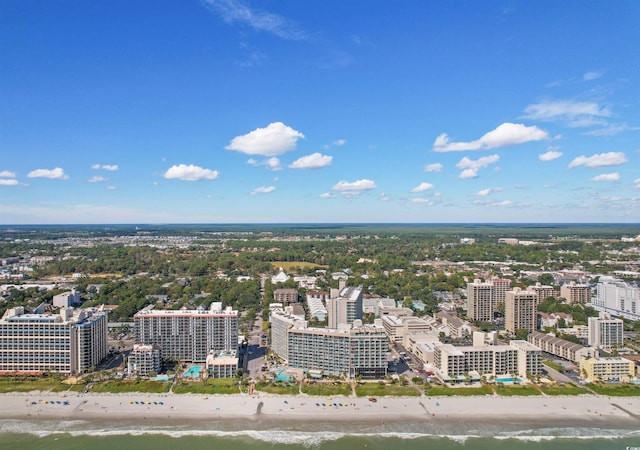 birds eye view of property featuring a view of the beach and a water view