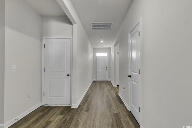 hall featuring dark hardwood / wood-style floors