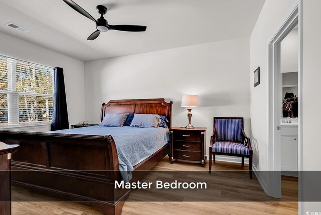 bedroom featuring ceiling fan and wood-type flooring