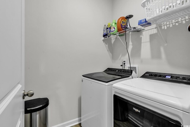 laundry room with washer and dryer