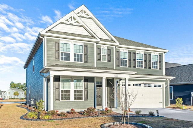 view of front of home with a garage