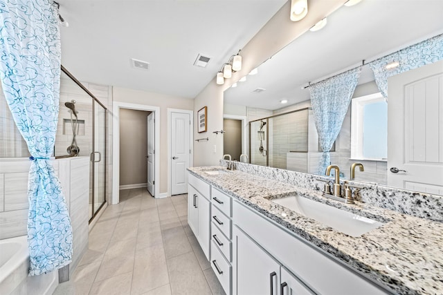 bathroom featuring separate shower and tub, tile patterned flooring, and vanity