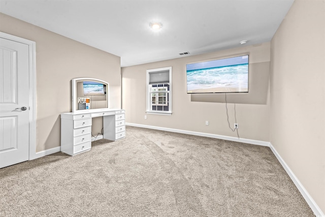 unfurnished bedroom with carpet floors