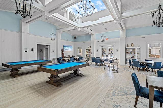 playroom with high vaulted ceiling, light hardwood / wood-style floors, beam ceiling, and pool table