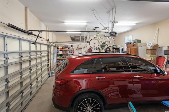 garage featuring a garage door opener