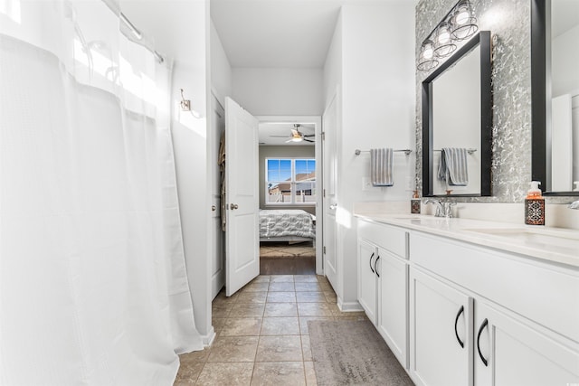 bathroom with vanity and ceiling fan