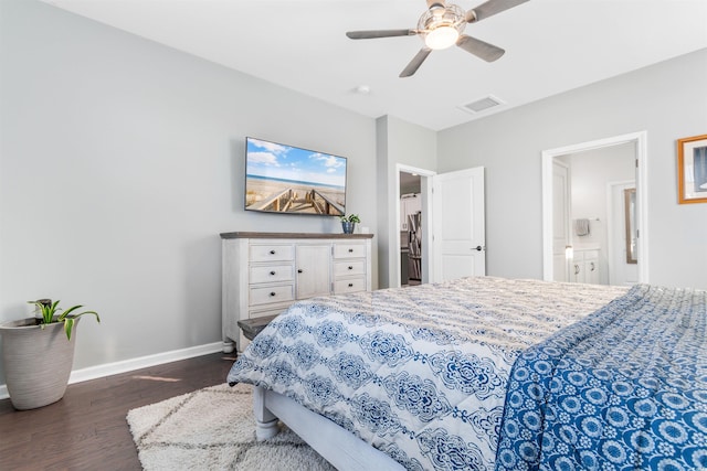 bedroom with ensuite bath, ceiling fan, and dark wood-type flooring