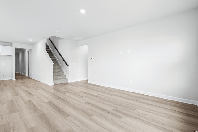 unfurnished living room with light hardwood / wood-style floors