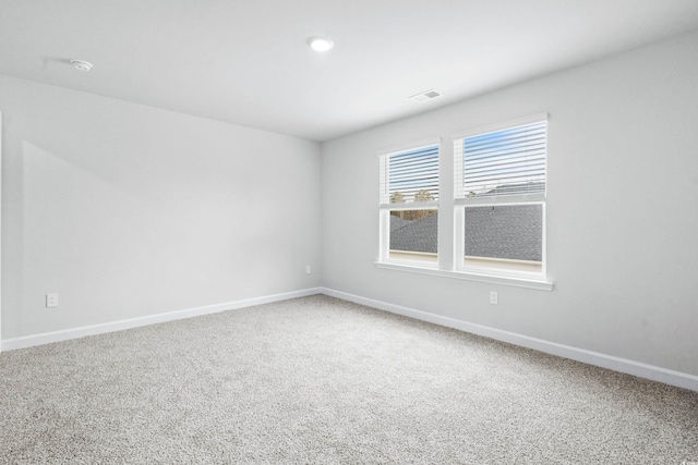 view of carpeted spare room