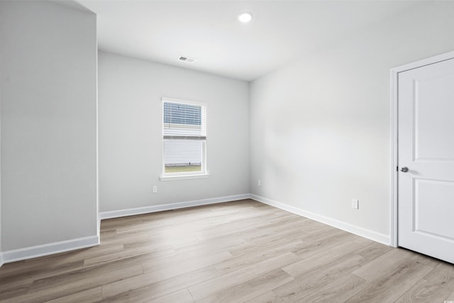 empty room featuring light hardwood / wood-style floors