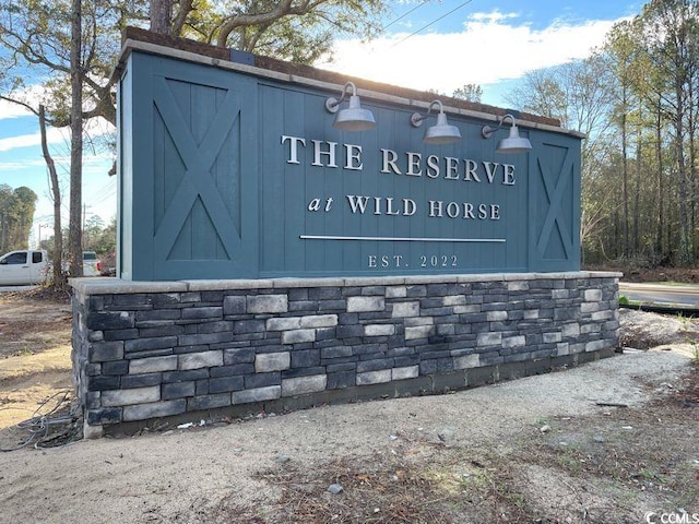 view of community sign