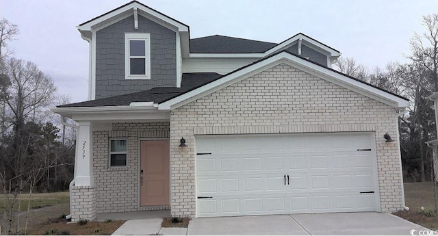 front of property with a garage