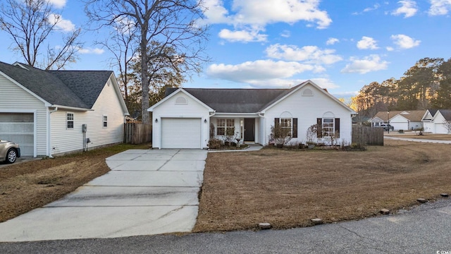 view of front of house featuring covered porch and a garage