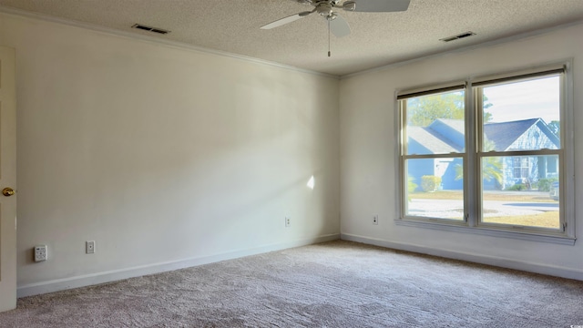 unfurnished room featuring crown molding, carpet flooring, ceiling fan, and a textured ceiling