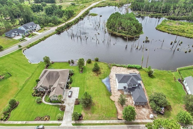 bird's eye view with a water view