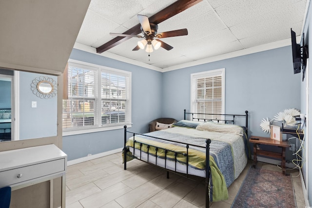 bedroom featuring ceiling fan and light tile patterned floors