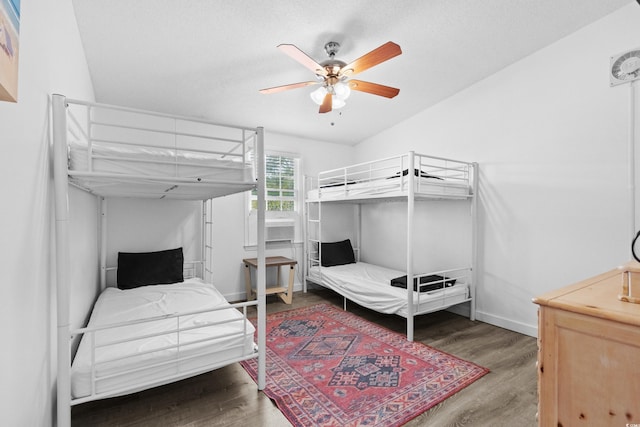 bedroom featuring ceiling fan and hardwood / wood-style flooring