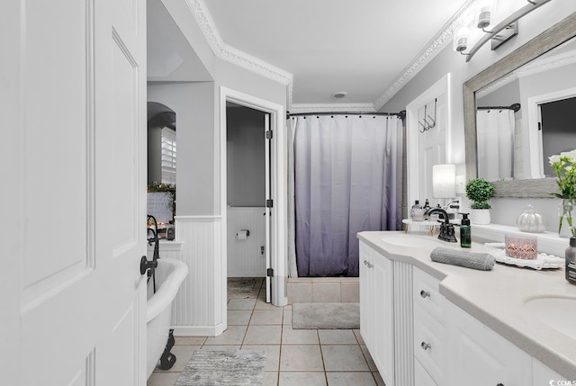 bathroom featuring tile patterned flooring, vanity, curtained shower, and crown molding