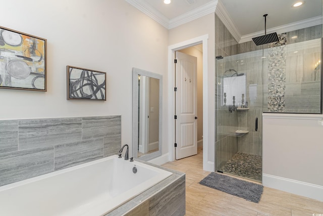 bathroom with separate shower and tub and crown molding